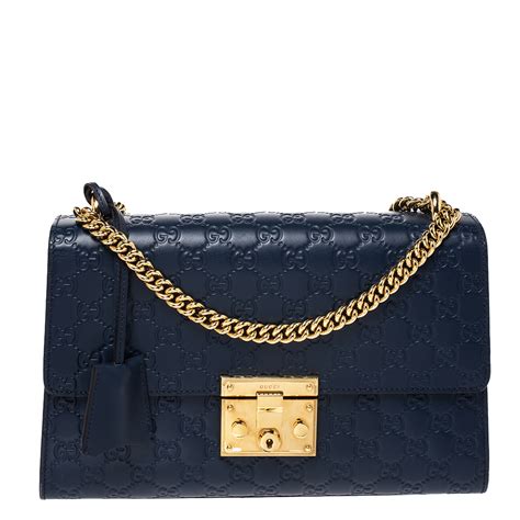 buy gucci oval shaped navy blue purse|Gucci outlet interlocking blue bag.